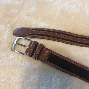 Men’s tan leather belt with black canvas inset